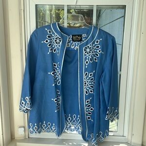 Little jacket with shell. Unique, light weight, easy to wear. So pretty,fun!